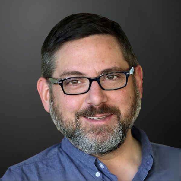 Man smiling with glasses and beard. Man smiling with glasses and beard.