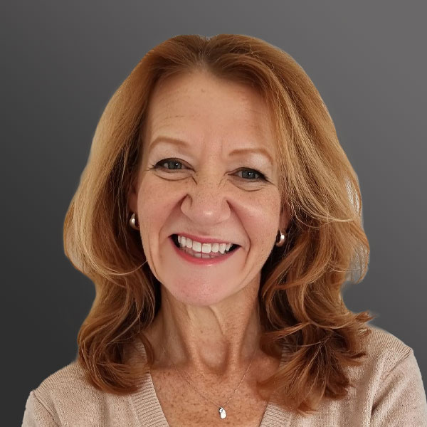 A woman with long hair and a smile. A woman with long hair and a smile.