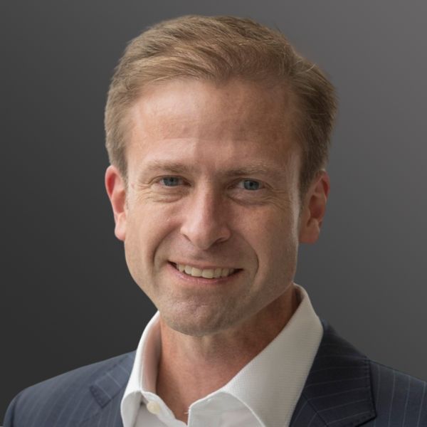 Man smiling in a suit and shirt. Man smiling in a suit and shirt.