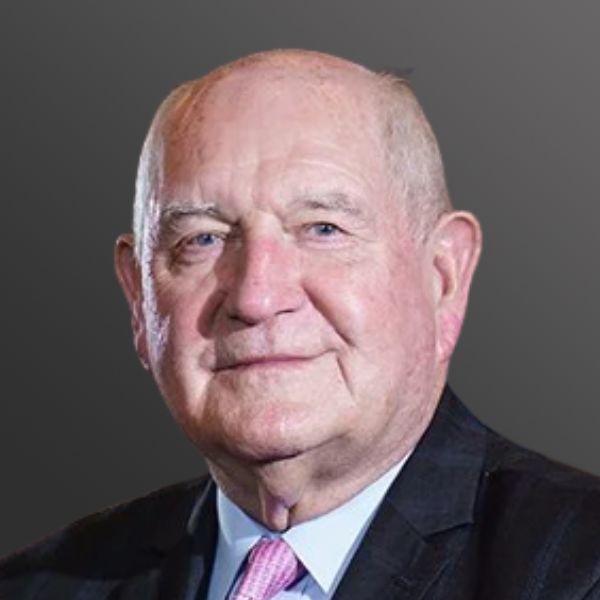 Elderly man in suit with gray background. Elderly man in suit with gray background.